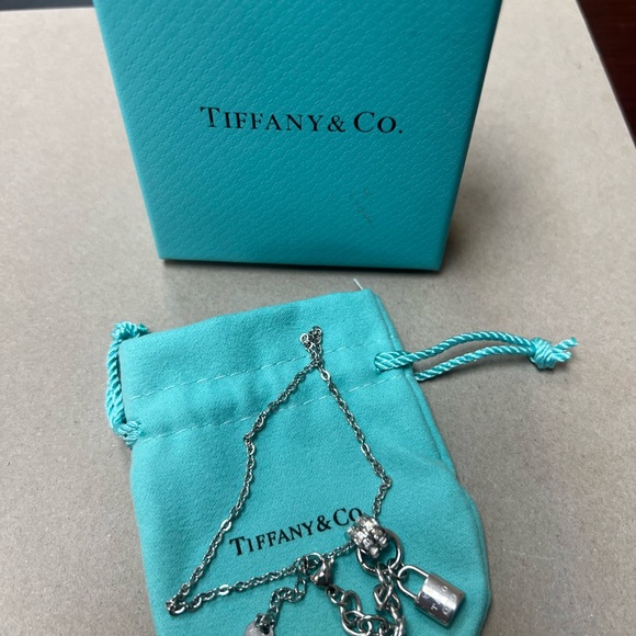Tiffany & Co. Jewelry - Tiffany & Co. Silver Bracelet with Lock Charm (box included)